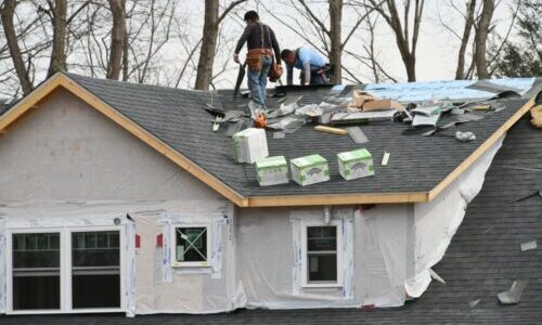 construction-workers-contractor-roofing-a-new-buil
